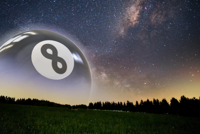 A giant black 8-ball hovers surrealistically over a grassy field under a star-filled night sky, with the Milky Way clearly visible and a line of silhouetted trees along the horizon.