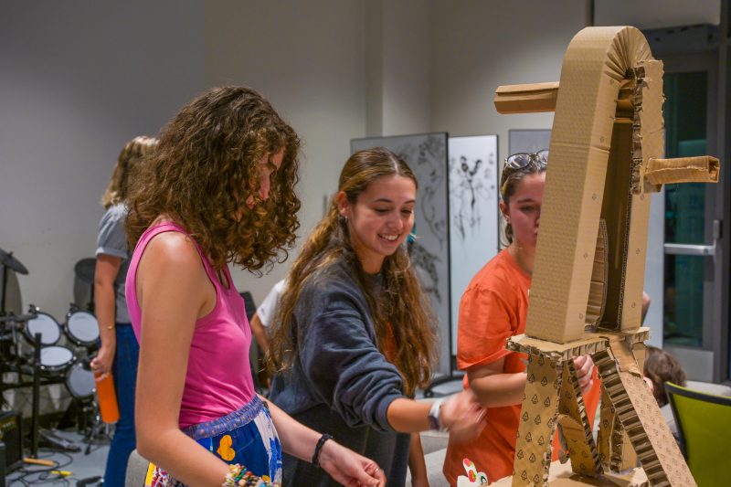 Studio 72 members work on a collaborative sculpture during a weekly program focused on discovering new art processes